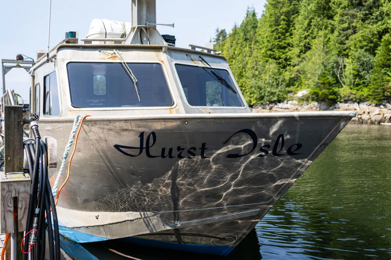 The resort's aluminium crew boat Hurst Isle tied alongside the dock